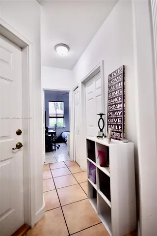 a bathroom with a sink and a washer dryer