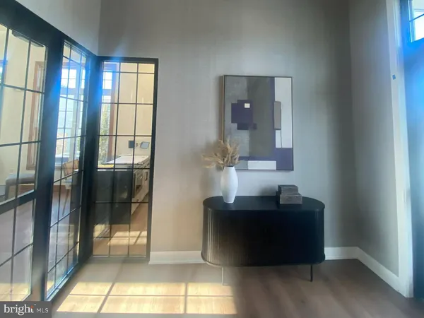 a living room with lots of furniture and window