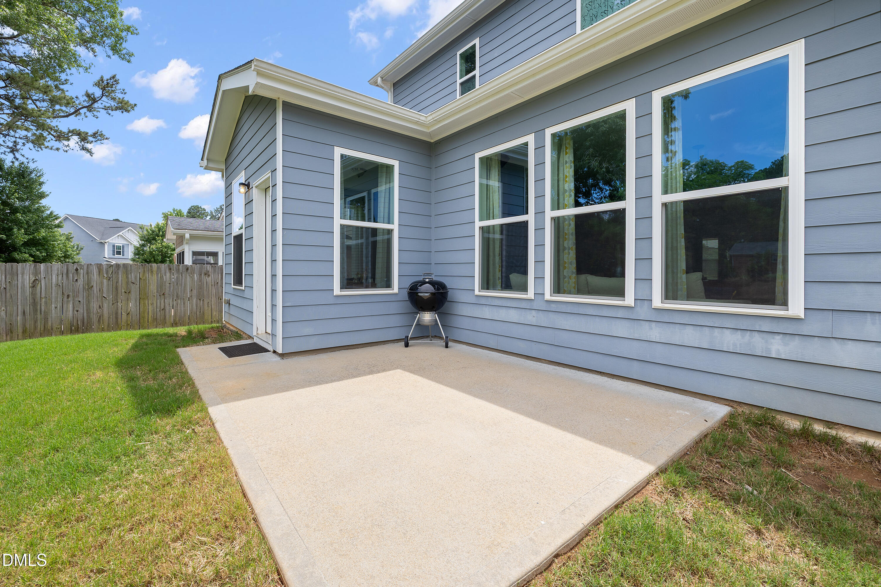 8059 Gilano Drive Raleigh, NC 27603 - Photo 39 of 43 front view of a house with a yard
