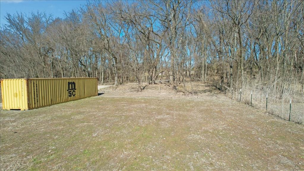 Tbd Gray Bottom Road Whitewright, TX 75491 - Photo 14 of 15 a view of a yard with a tree