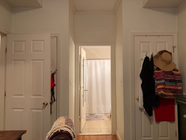 328 Sumner Street, Unit 2 Boston, MA 02128 - Photo 9 of 15 a view of hallway with furniture and a gate