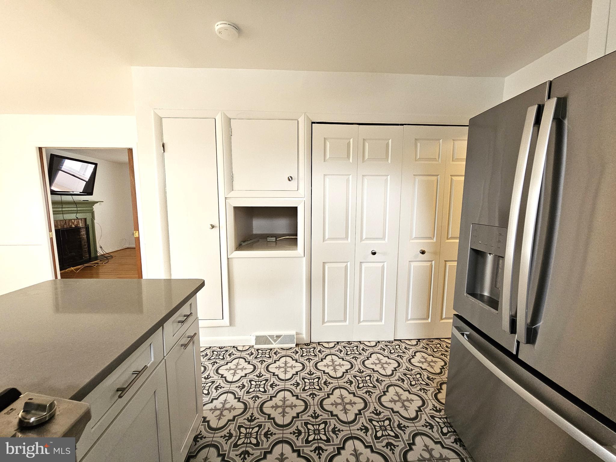 103 Shawnee Circle Cambridge, MD 21613 - Photo 11 of 49 a kitchen with granite countertop a refrigerator and a sink