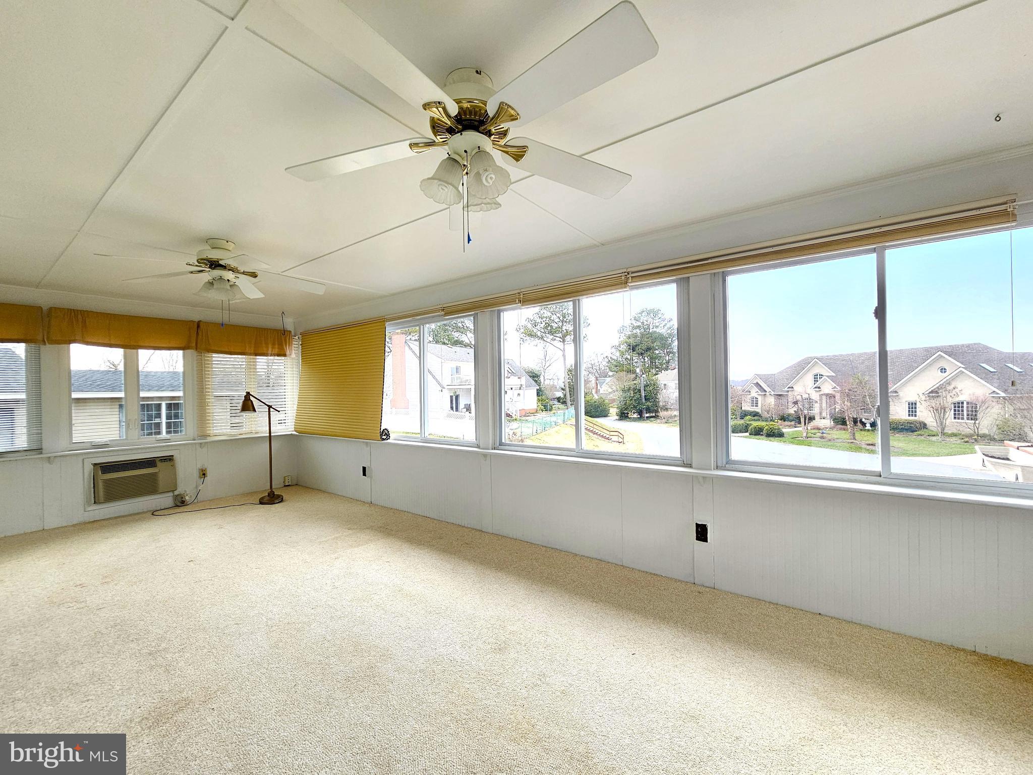 103 Shawnee Circle Cambridge, MD 21613 - Photo 19 of 49 a view of an empty room with a window
