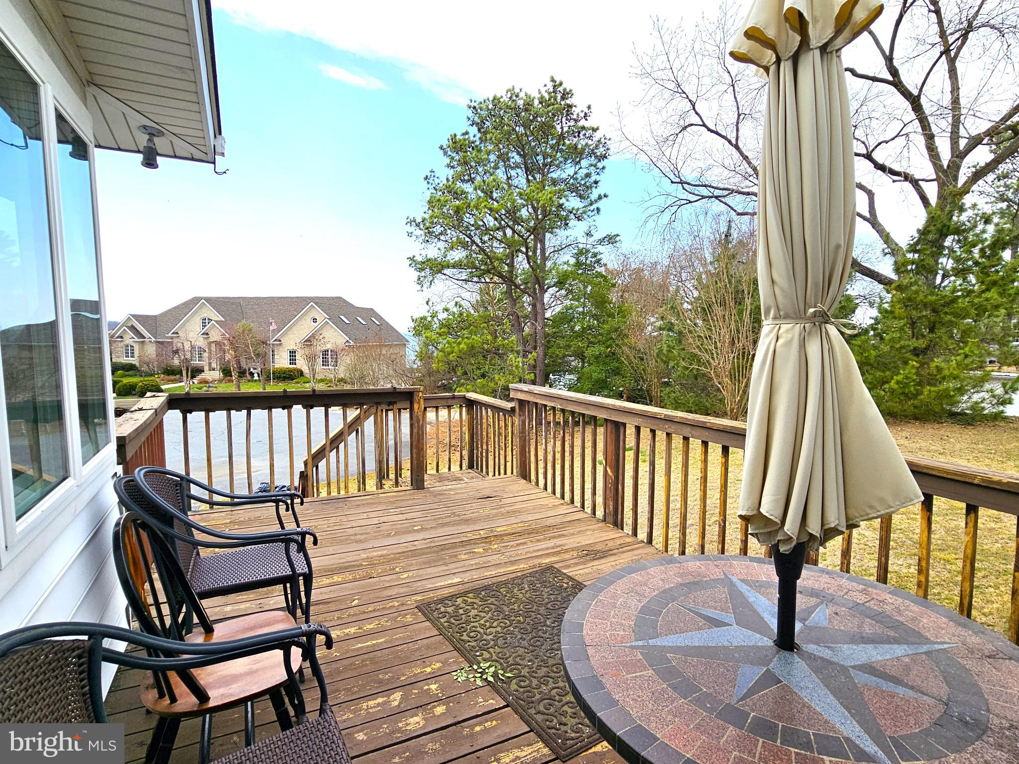 103 Shawnee Circle Cambridge, MD 21613 - Photo 21 of 49 a view of a chairs on the roof deck