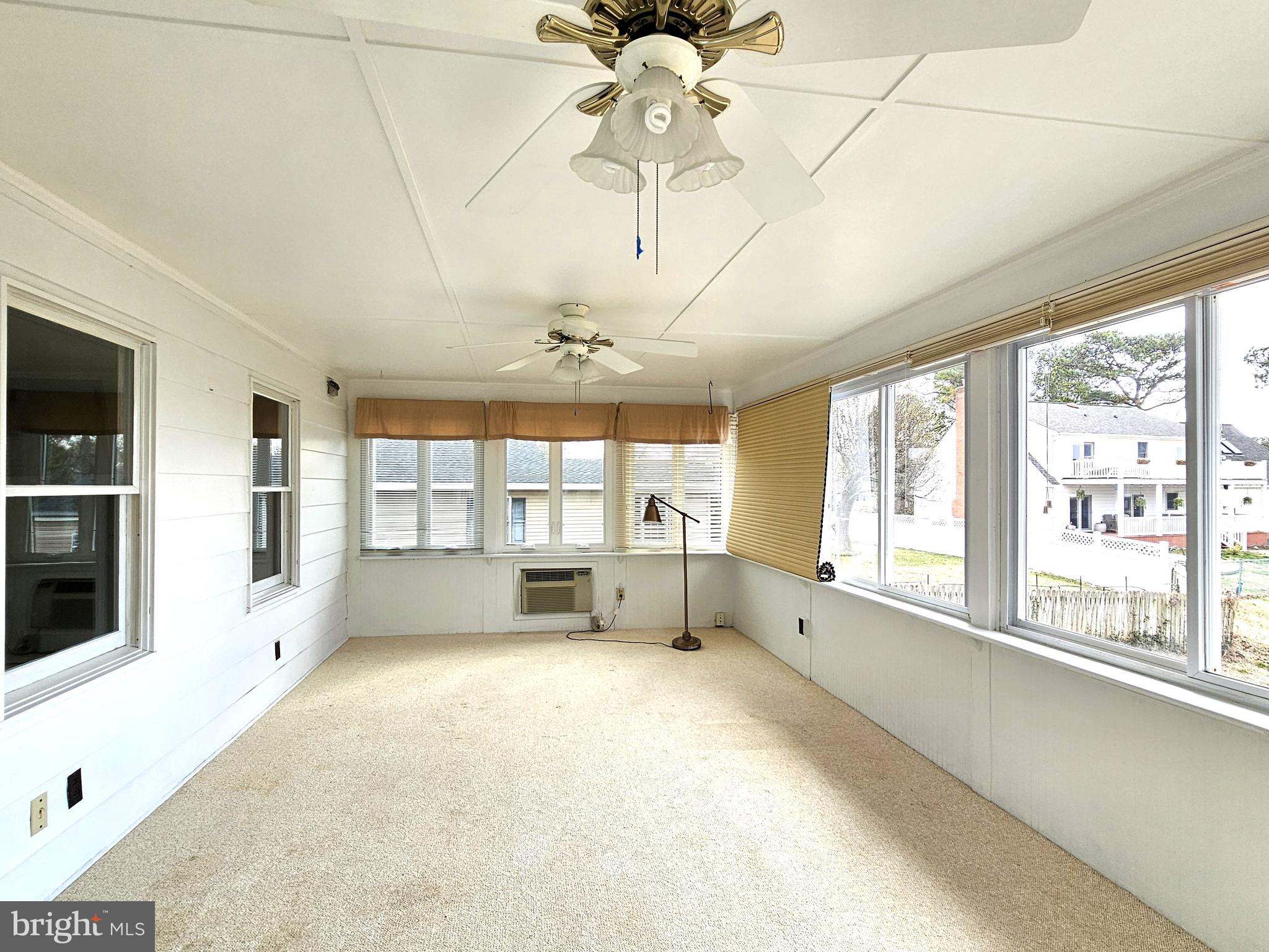 103 Shawnee Circle Cambridge, MD 21613 - Photo 22 of 49 a large white room with a large window