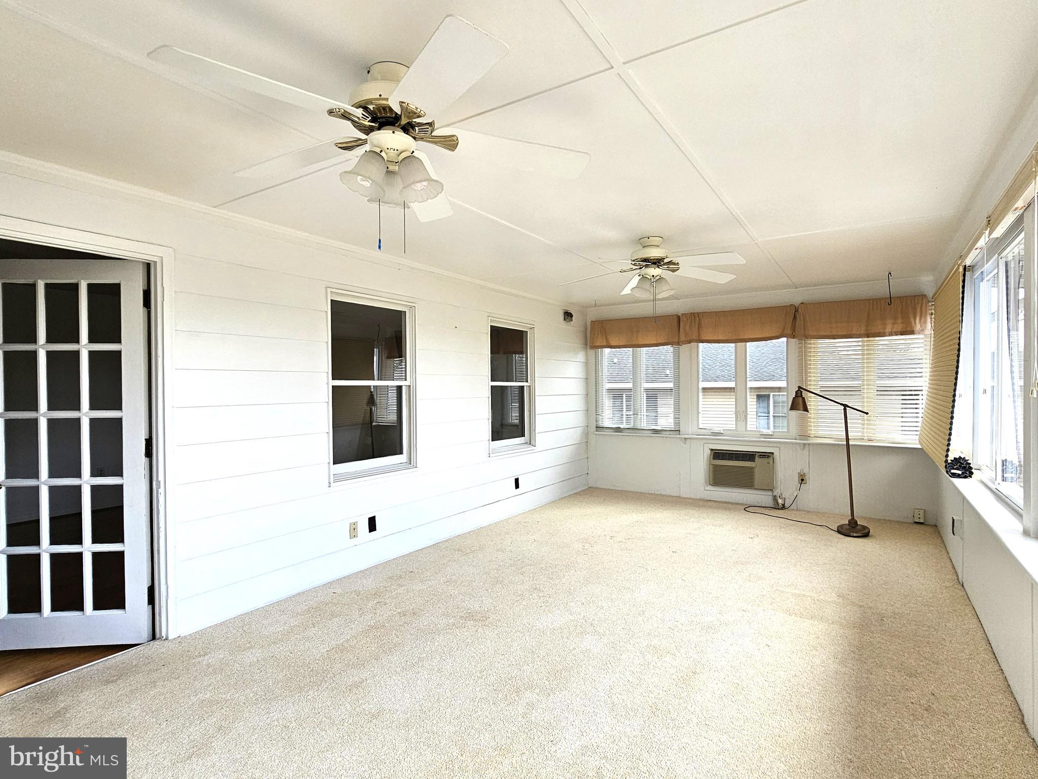 103 Shawnee Circle Cambridge, MD 21613 - Photo 23 of 49 a view of an empty room with a window