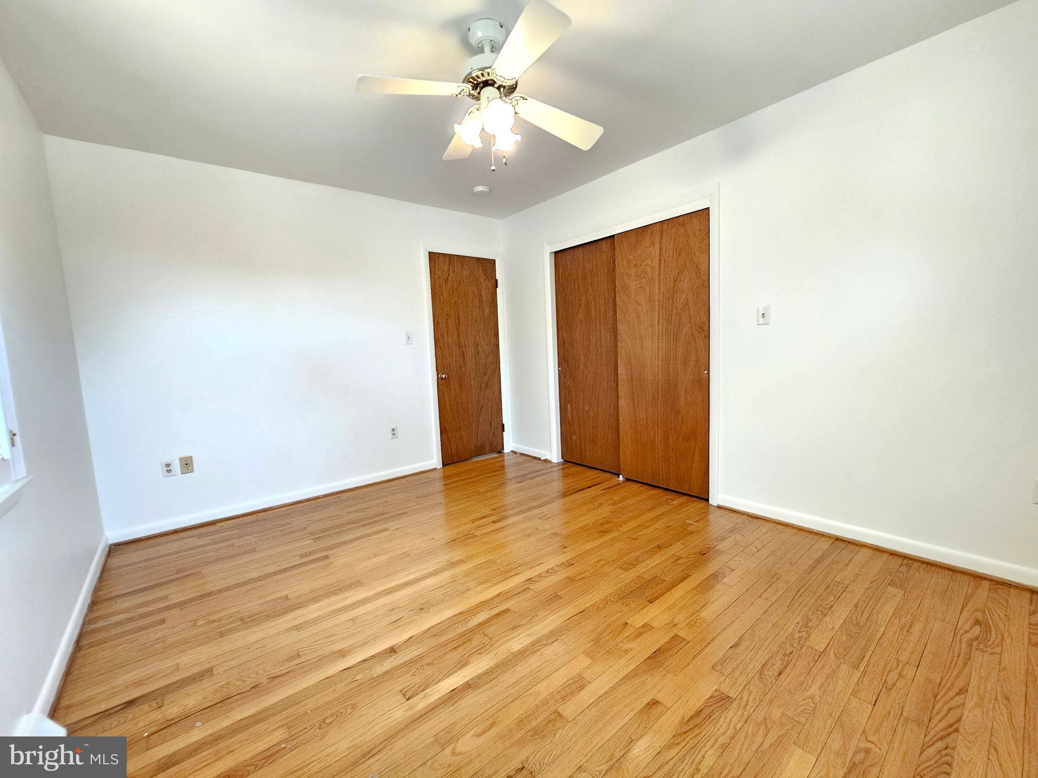 103 Shawnee Circle Cambridge, MD 21613 - Photo 45 of 49 wooden floor in an empty room