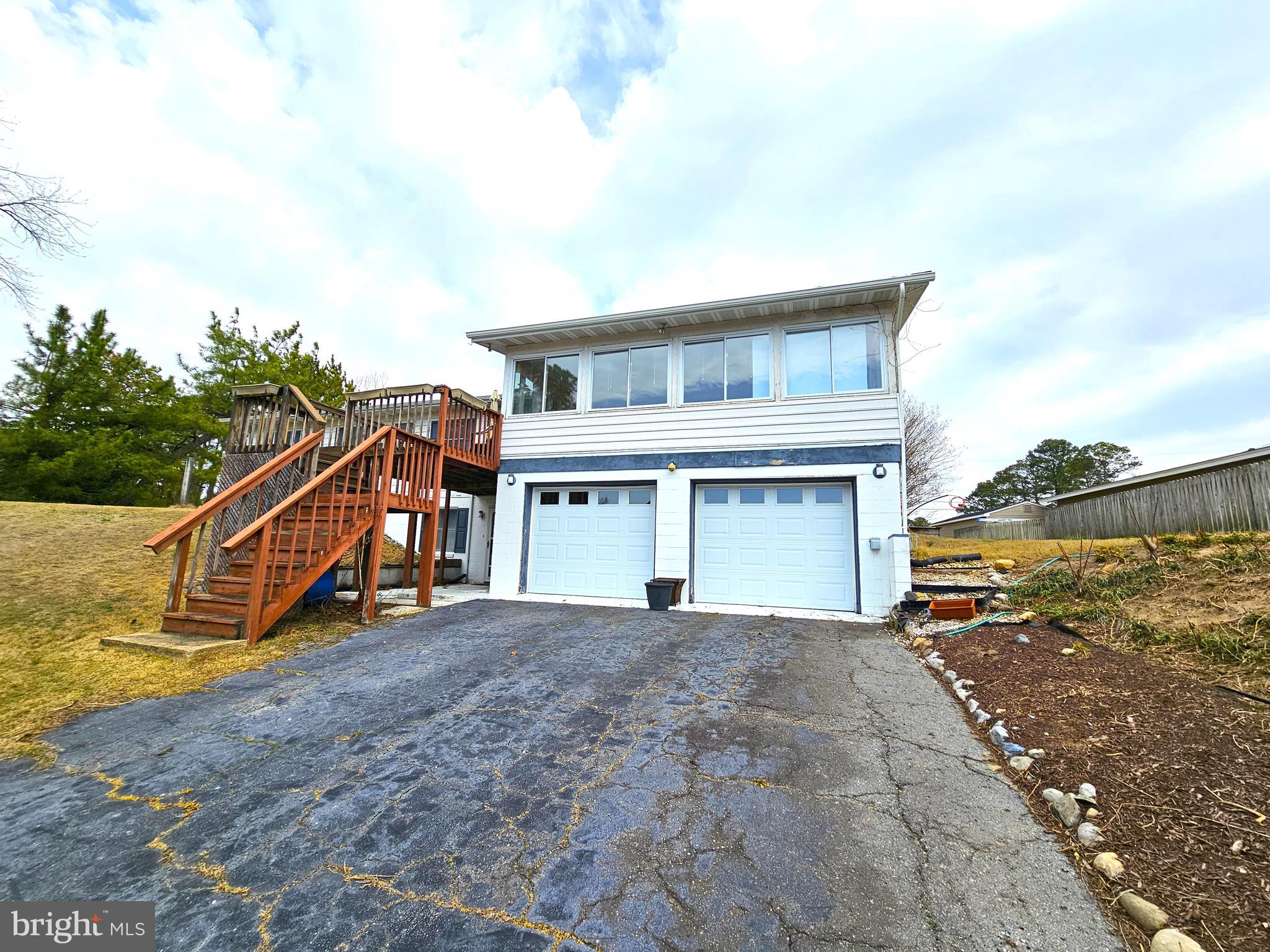 103 Shawnee Circle Cambridge, MD 21613 - Photo 6 of 49 a view of a house with a yard