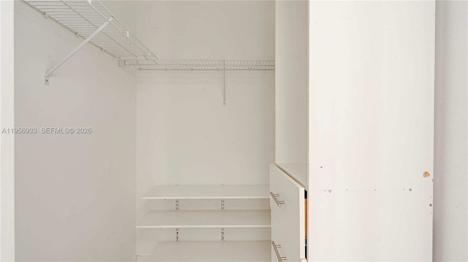 90 Southwest 3rd Street, Unit PH10 Miami, FL 33130 - Photo 12 of 31 a view of closet