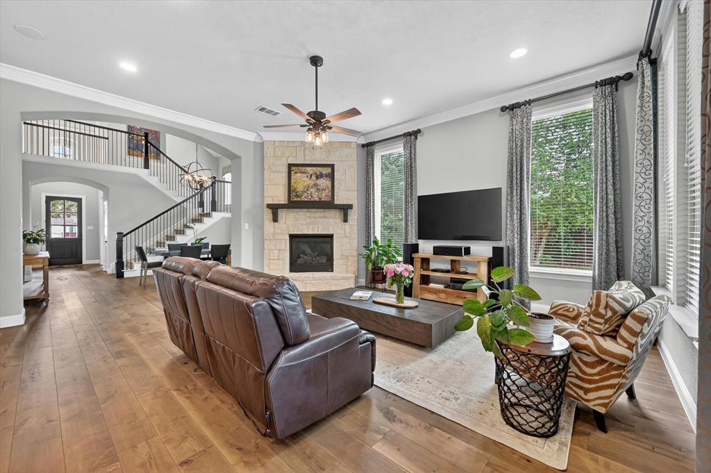 6656 Roughleaf Ridge Road Flower Mound, TX 76226 - Photo 6 of 40 a living room with furniture fireplace and flat screen tv