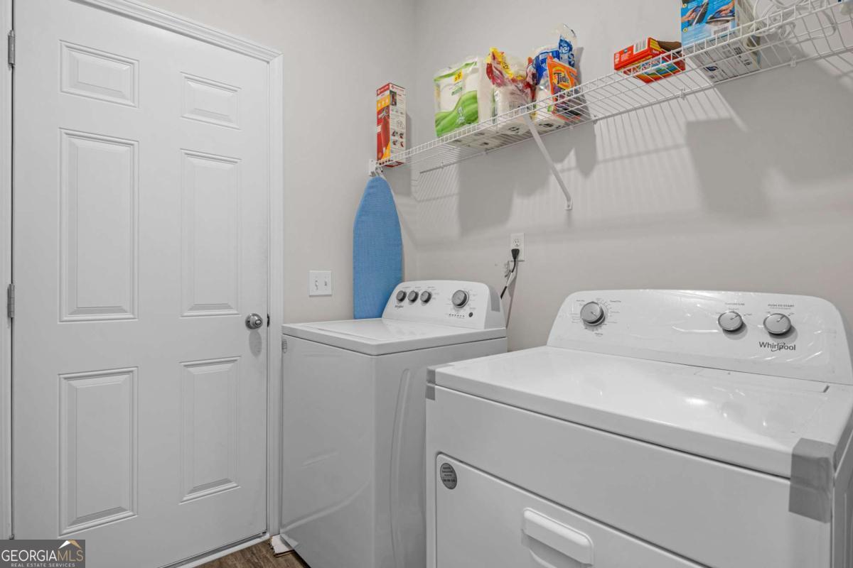 505 Rutledge Drive Hinesville, GA 31313 - Photo 12 of 24 a utility room with dryer and washer