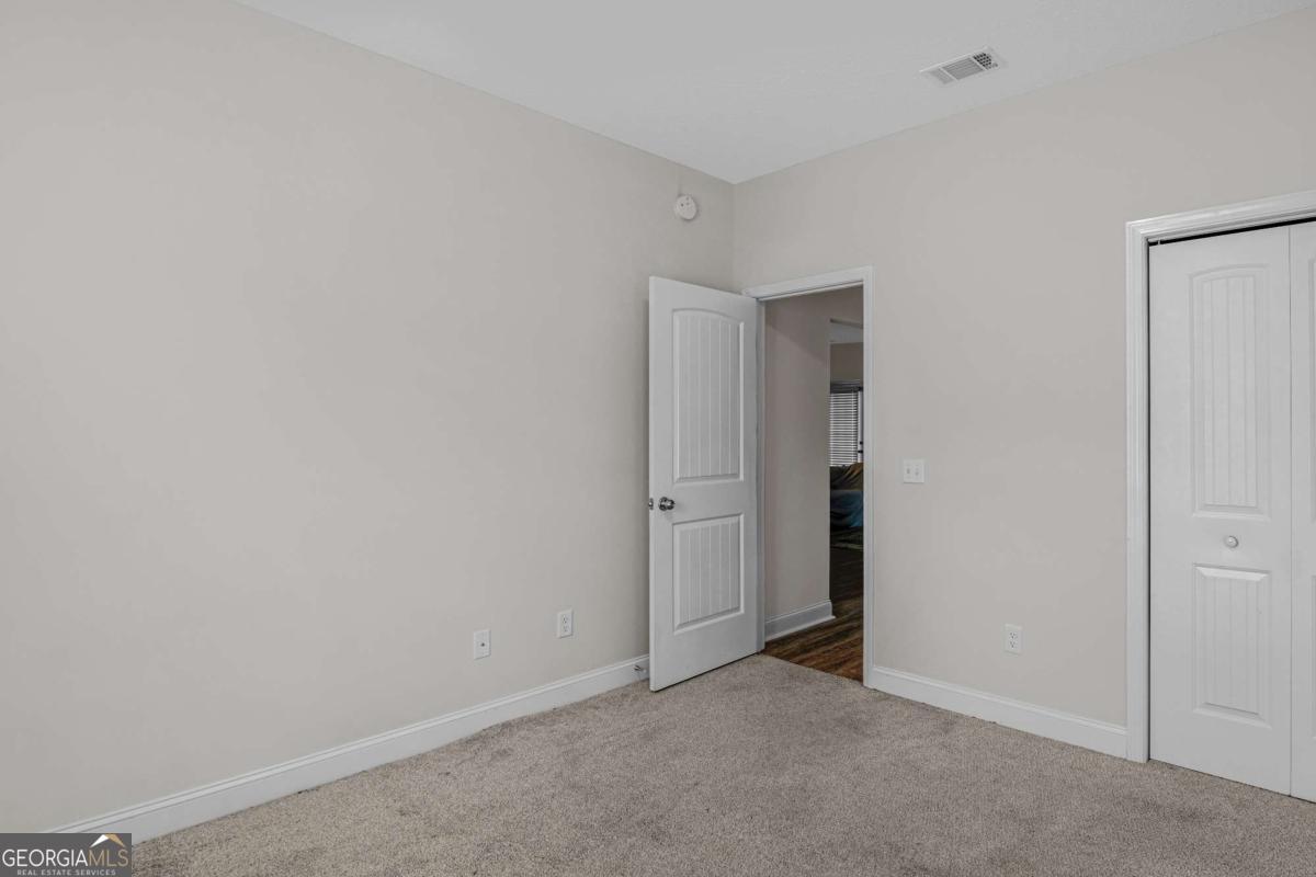 505 Rutledge Drive Hinesville, GA 31313 - Photo 4 of 24 a view of an empty room