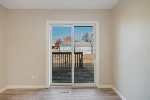 a view of a room that has a window