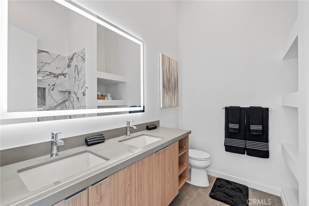 62050 Sonora Road Joshua Tree, CA 92252 - Photo 19 of 40 a bathroom with a sink toilet and mirror