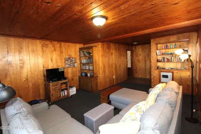 a kitchen with window and cabinets