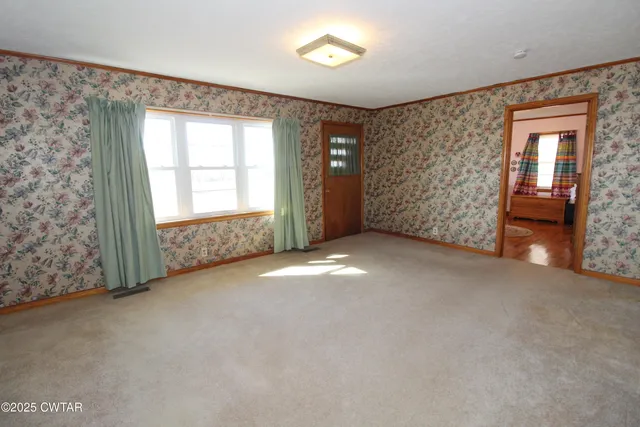 a view of entryway with stairs