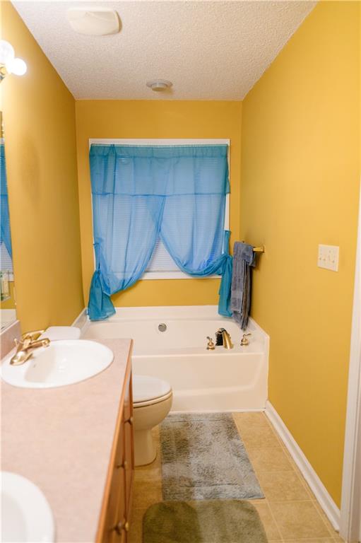 1581 Highway 77 Union Point, GA 30669 - Photo 13 of 17 a bathroom with a sink and a mirror