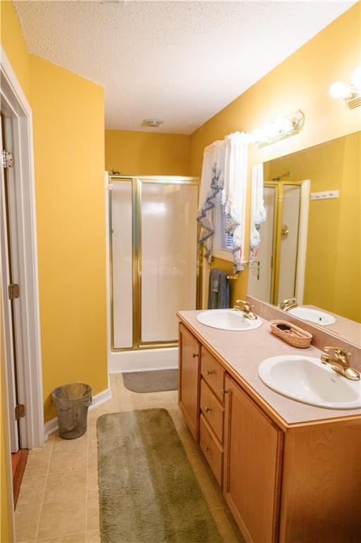1581 Highway 77 Union Point, GA 30669 - Photo 14 of 17 a bathroom with a sink and a mirror