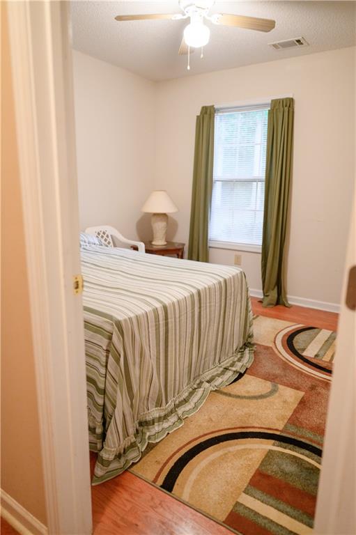 1581 Highway 77 Union Point, GA 30669 - Photo 9 of 17 a bedroom with a bed and a window