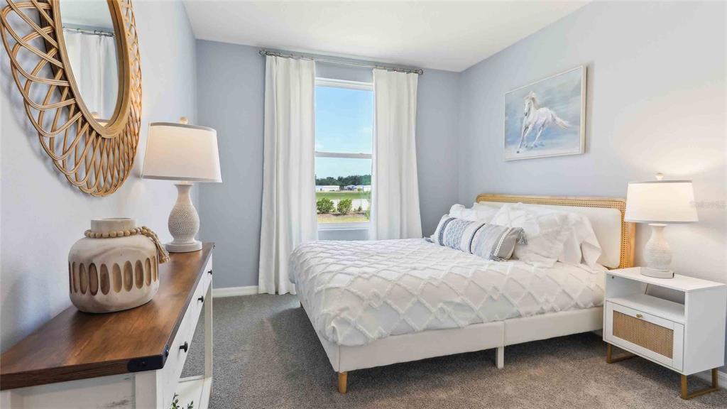 8196 Southwest 67th Avenue Ocala, FL 34476 - Photo 16 of 20 a bedroom with a bed and a window