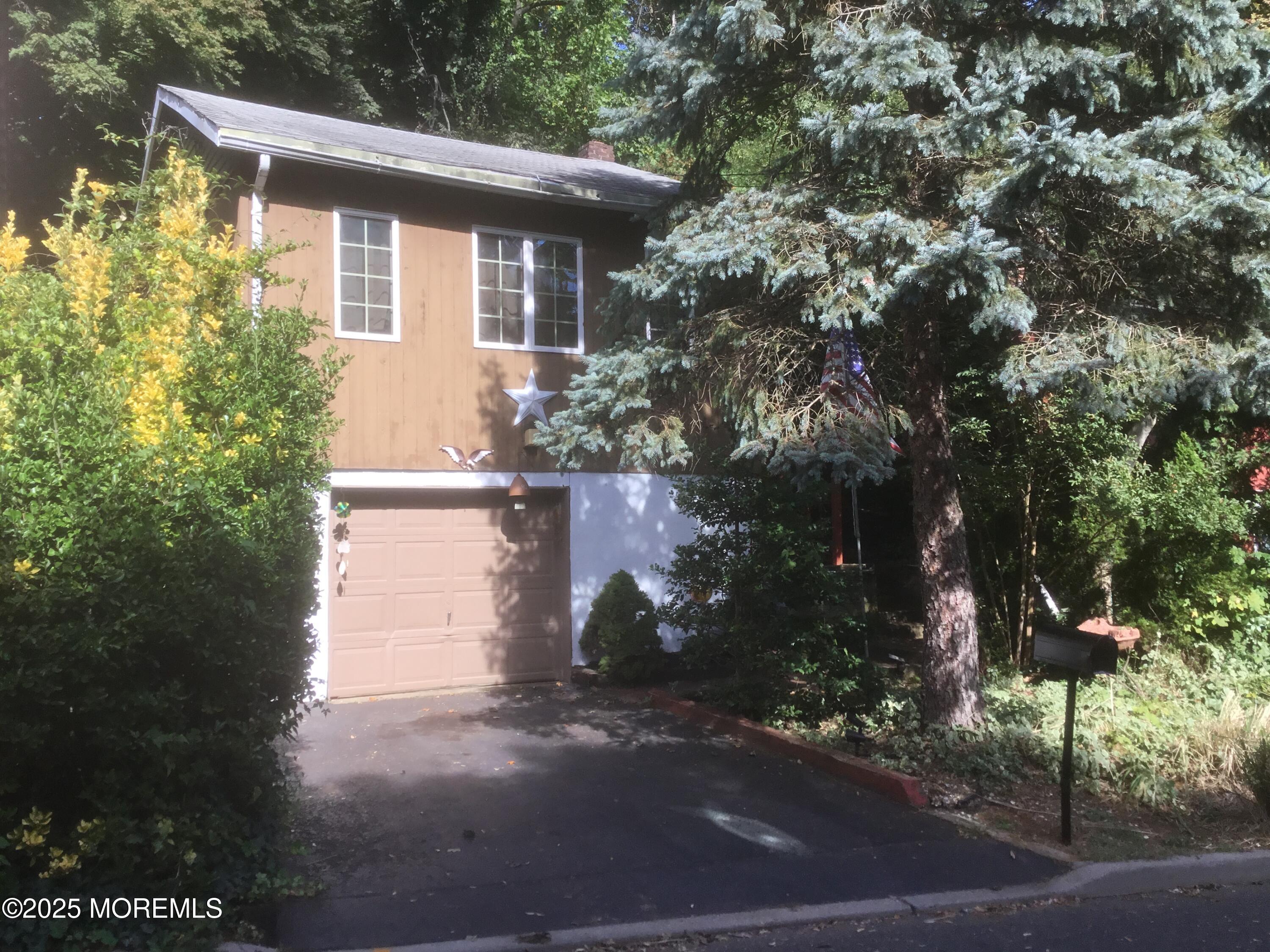 94 Valley Avenue Highlands, NJ 07732 - Photo 1 of 12 a front view of house with yard