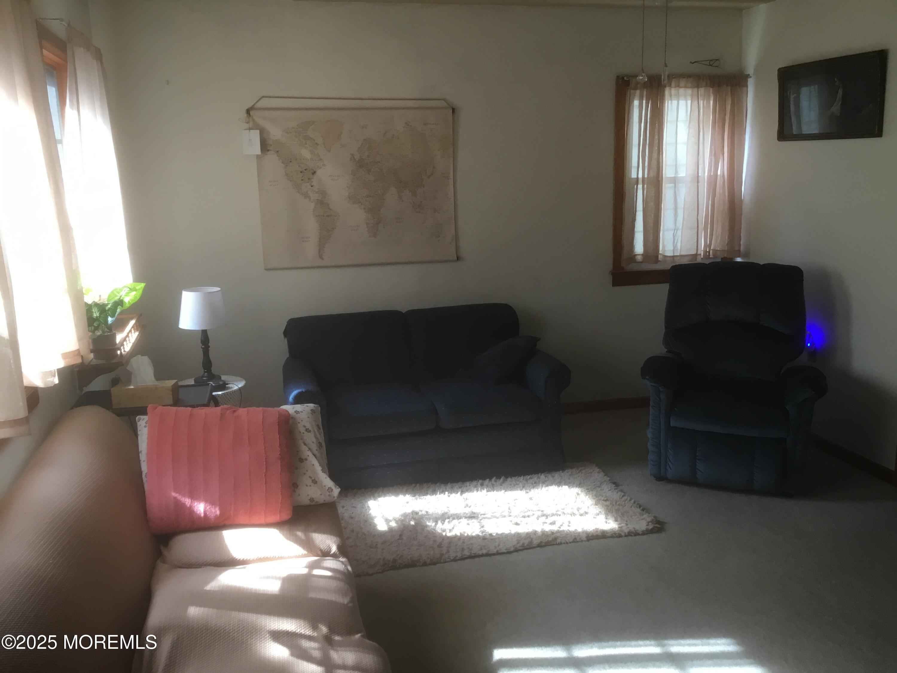 94 Valley Avenue Highlands, NJ 07732 - Photo 4 of 12 a living room with furniture and a window