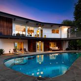 a view of a house with swimming pool