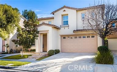 18 Coriander Irvine, CA 92603 - Photo 1 of 29 a front view of a house with garden