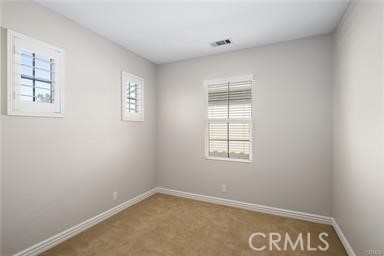 18 Coriander Irvine, CA 92603 - Photo 12 of 29 an empty room with windows