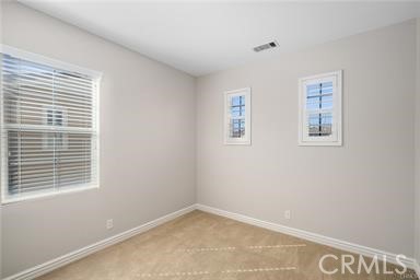 18 Coriander Irvine, CA 92603 - Photo 13 of 29 a view of an empty room with a window