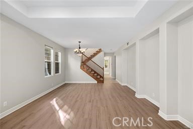 18 Coriander Irvine, CA 92603 - Photo 4 of 29 a view of an entryway with wooden floor