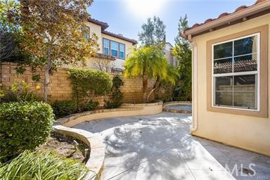18 Coriander Irvine, CA 92603 - Photo 10 of 29 a view of a house with a yard