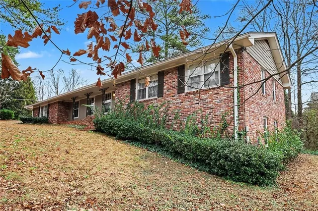 a backyard of a house with lots of green space