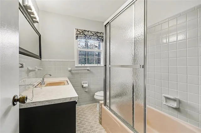 a bathroom with a sink and a shower