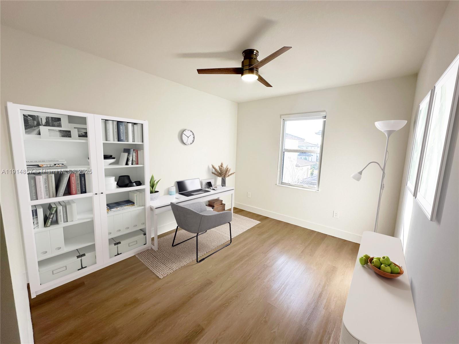 12273 Southwest 44th Street Davie, FL 33330 - Photo 21 of 31 a living room with furniture and a wooden floor