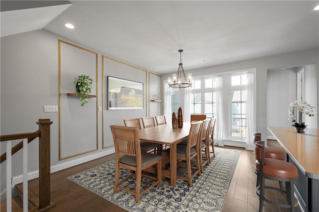 2013 Ashton Row Bridgeville, PA 15017 - Photo 12 of 33 a view of a dining room with furniture window and wooden floor