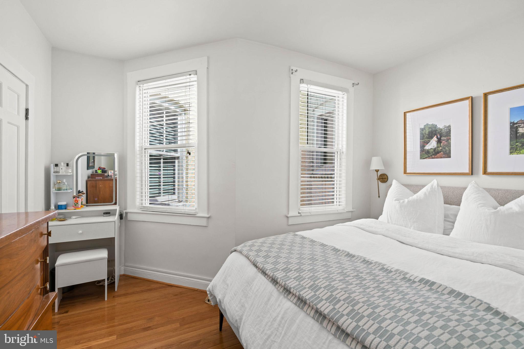 1656 Avon Place Northwest Washington, DC 20007 - Photo 16 of 20 a bedroom with a bed and a window