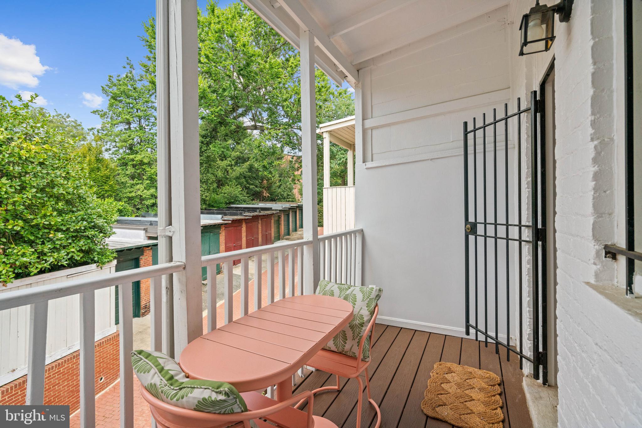 1656 Avon Place Northwest Washington, DC 20007 - Photo 19 of 20 a view of a balcony with chair and wooden floor