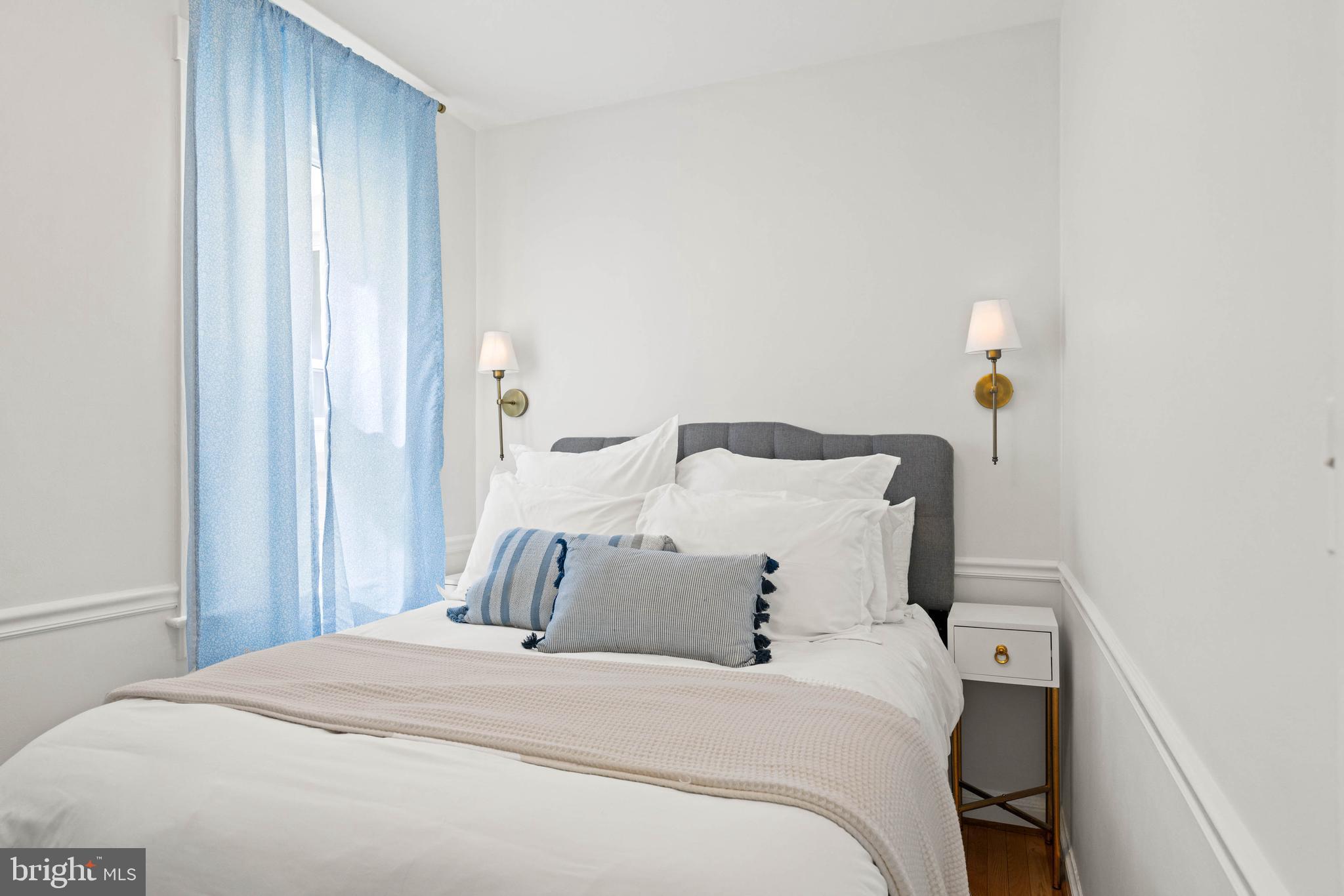 1656 Avon Place Northwest Washington, DC 20007 - Photo 6 of 20 a bedroom with a bed and a window