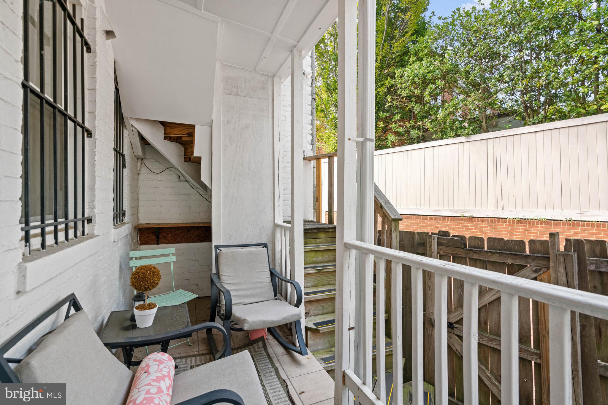 1656 Avon Place Northwest Washington, DC 20007 - Photo 10 of 20 a view of balcony with couch