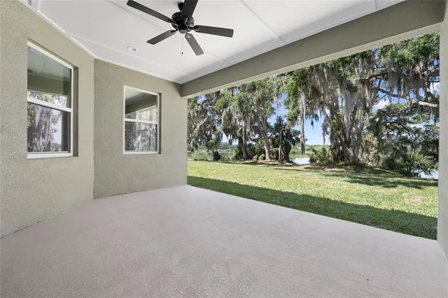 a view of livingroom with yard and staircase
