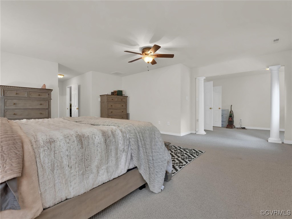 5512 Garden Grove Road Chesterfield, VA 23832 - Photo 25 of 48 Carpeted bedroom with ceiling fan and ornate colum