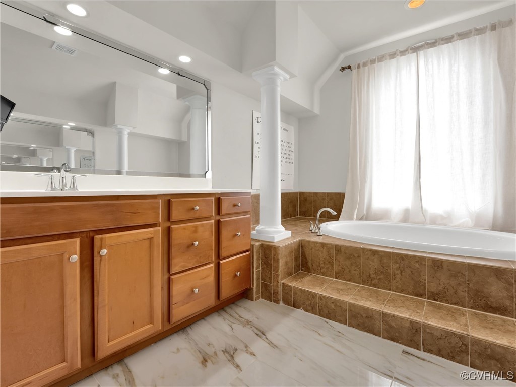 5512 Garden Grove Road Chesterfield, VA 23832 - Photo 30 of 48 Bathroom with tiled bath, vanity, ornate columns,