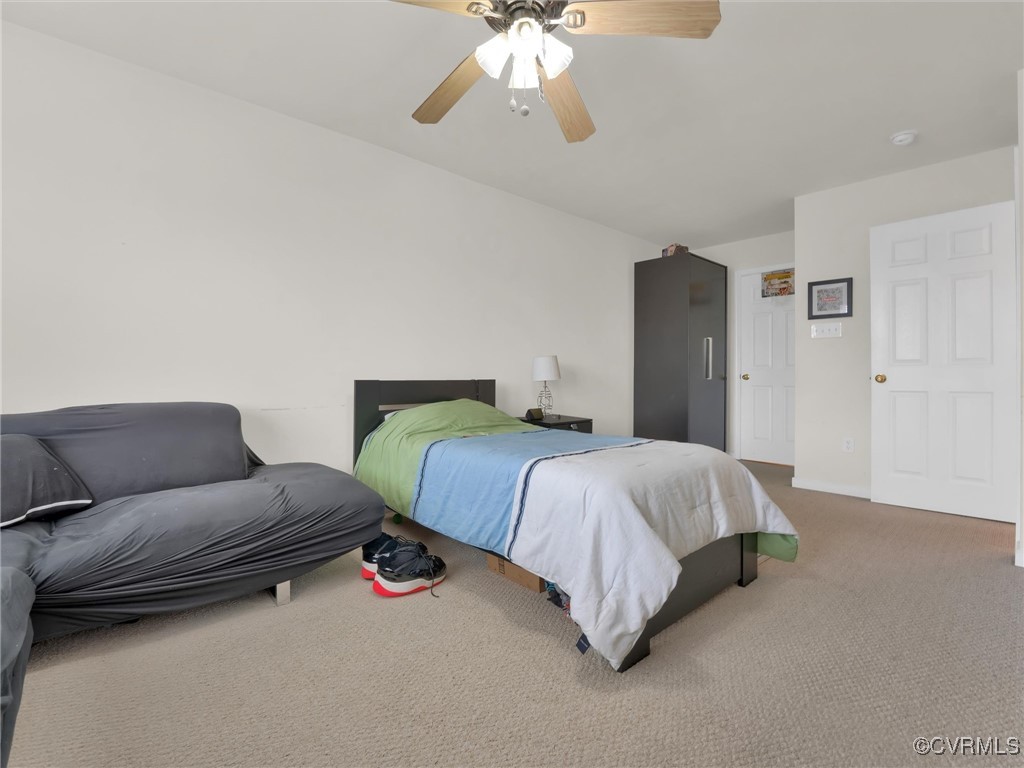 5512 Garden Grove Road Chesterfield, VA 23832 - Photo 40 of 48 Bedroom with ceiling fan and carpet floors