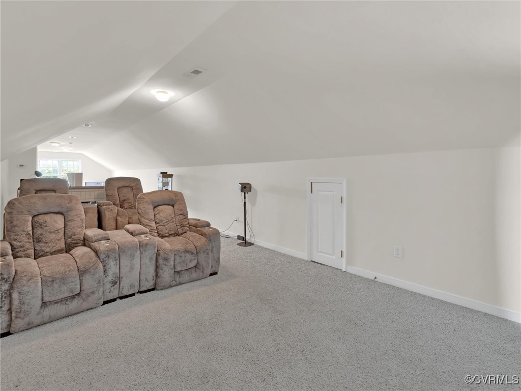 5512 Garden Grove Road Chesterfield, VA 23832 - Photo 45 of 48 Carpeted home theater with lofted ceiling