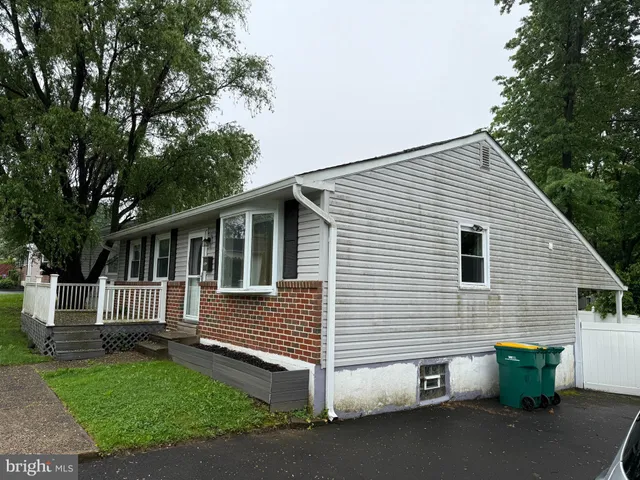a front view of a house with a garage