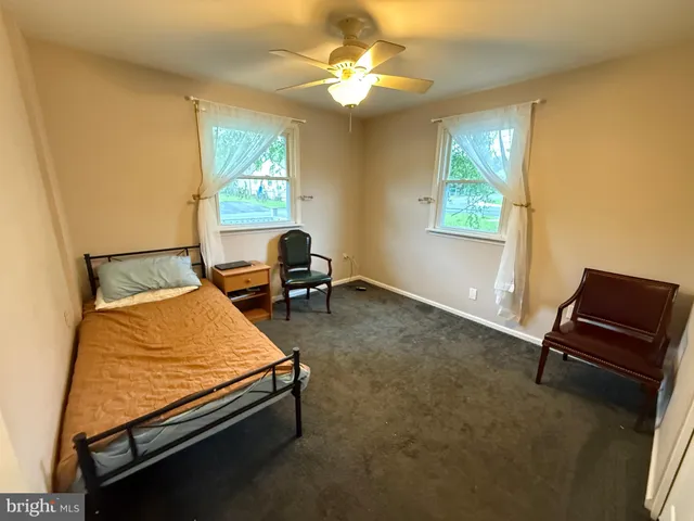 a room with furniture and a window