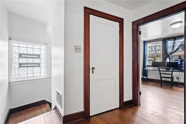 a view of livingroom with hardwood and furniture