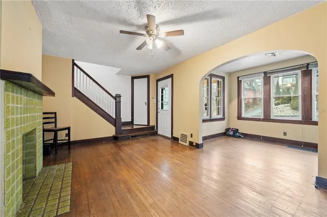 a view of an empty room with glass door