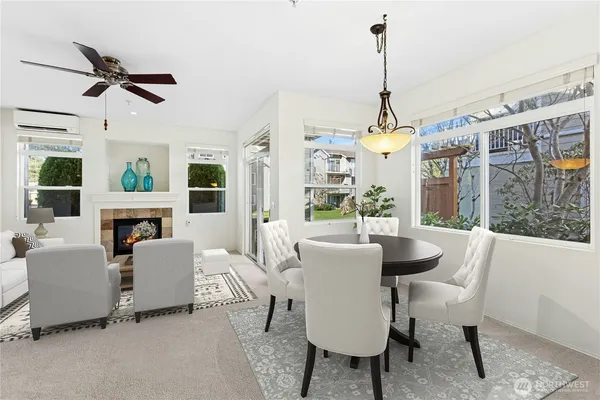 a view of a dining room with furniture window and outside view